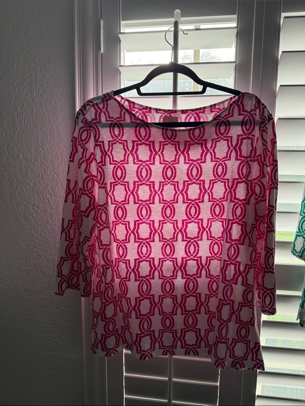 2 Chico's Geometric Boatneck Tunics;
One pink, one green, both size 3